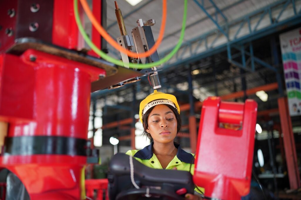 robotics engineer working on maintenance of robotics